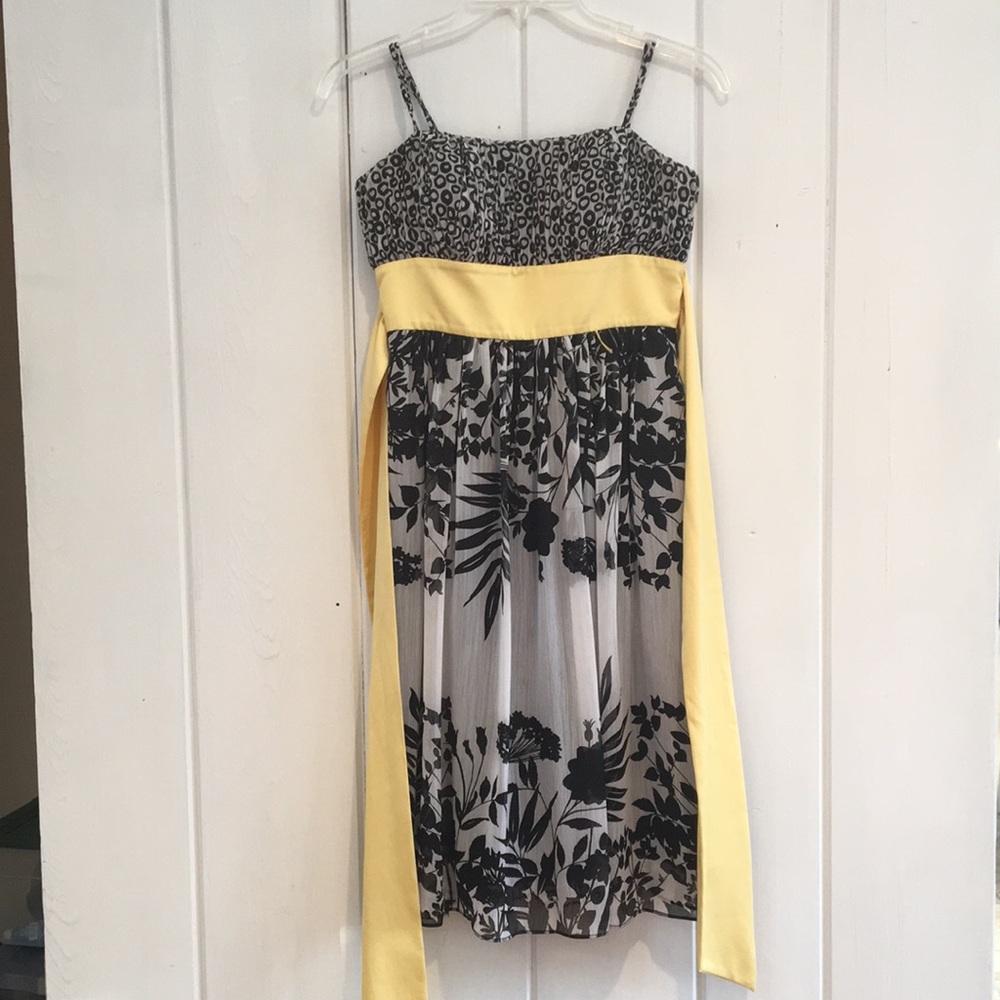Floral black/white dress with yellow sash